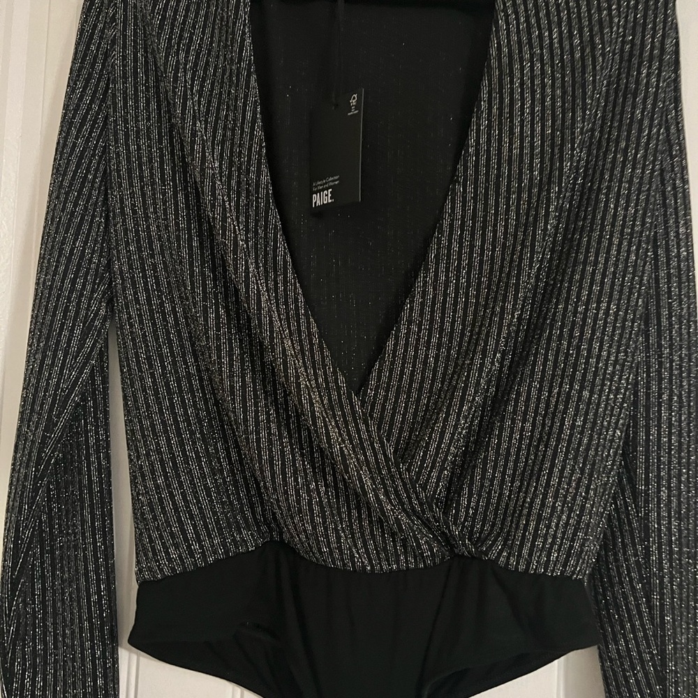 Subtle sparkle makes the Paige Julienne bodysuit an alluring option.